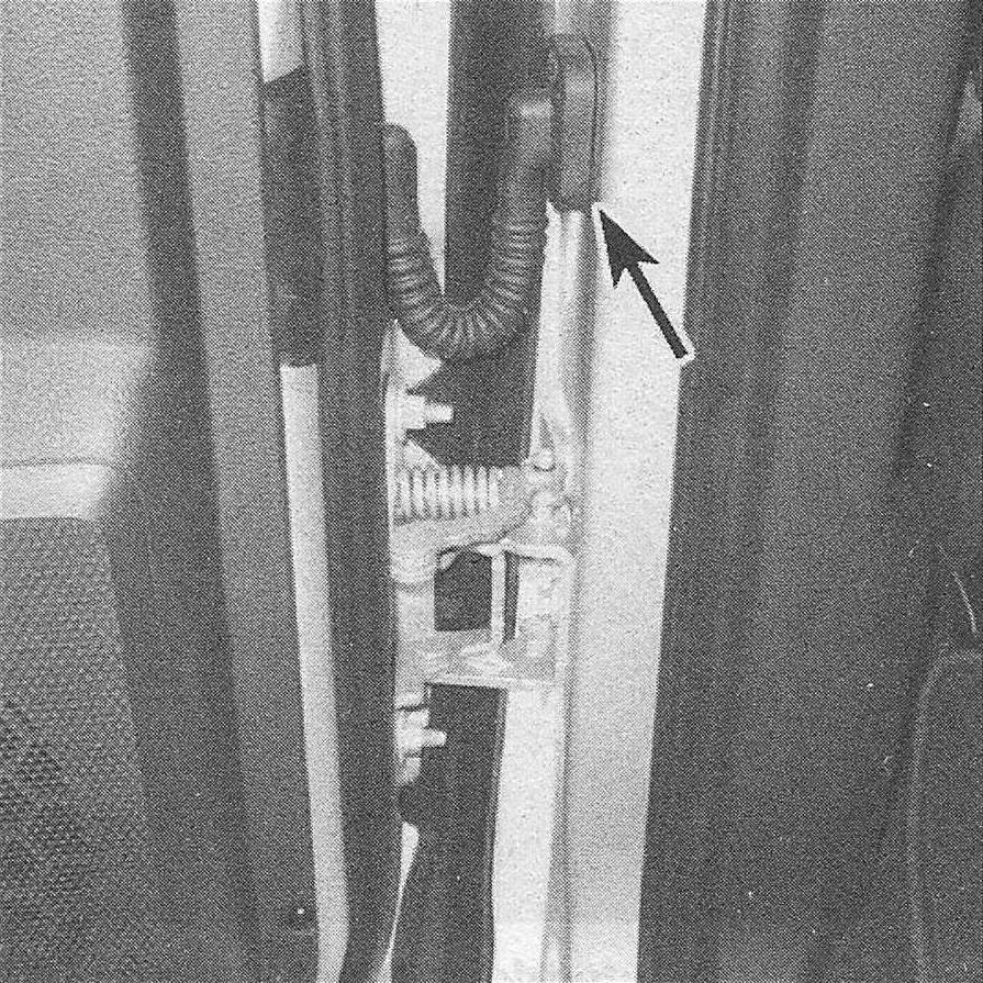 Ram Trucks Door carrier plate, latch, handles and lock cylinder - Carefully pull this grommet loose to reach the wiring connector