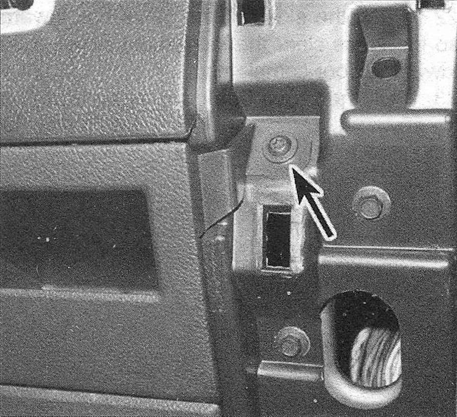 Ram Trucks Dashboard trim panels - Two screws secure the lower left trim panel; one screw not shown can be reached with the door open