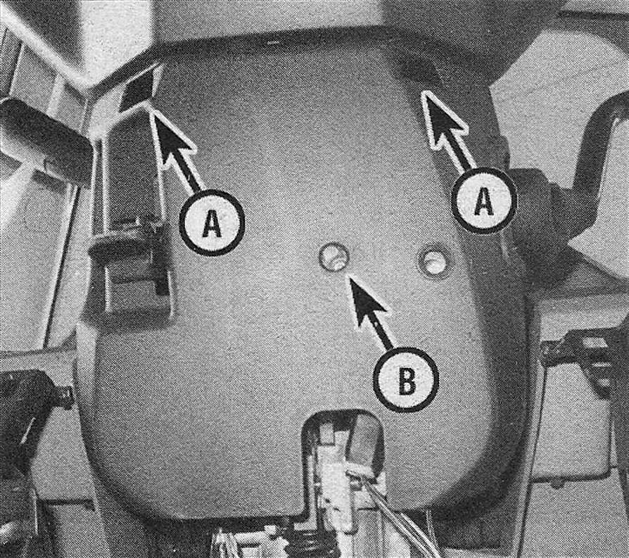 Ram Trucks Steering column covers - Two screws (A) attach the column covers together - another screw (B) secures the lower cover to the column