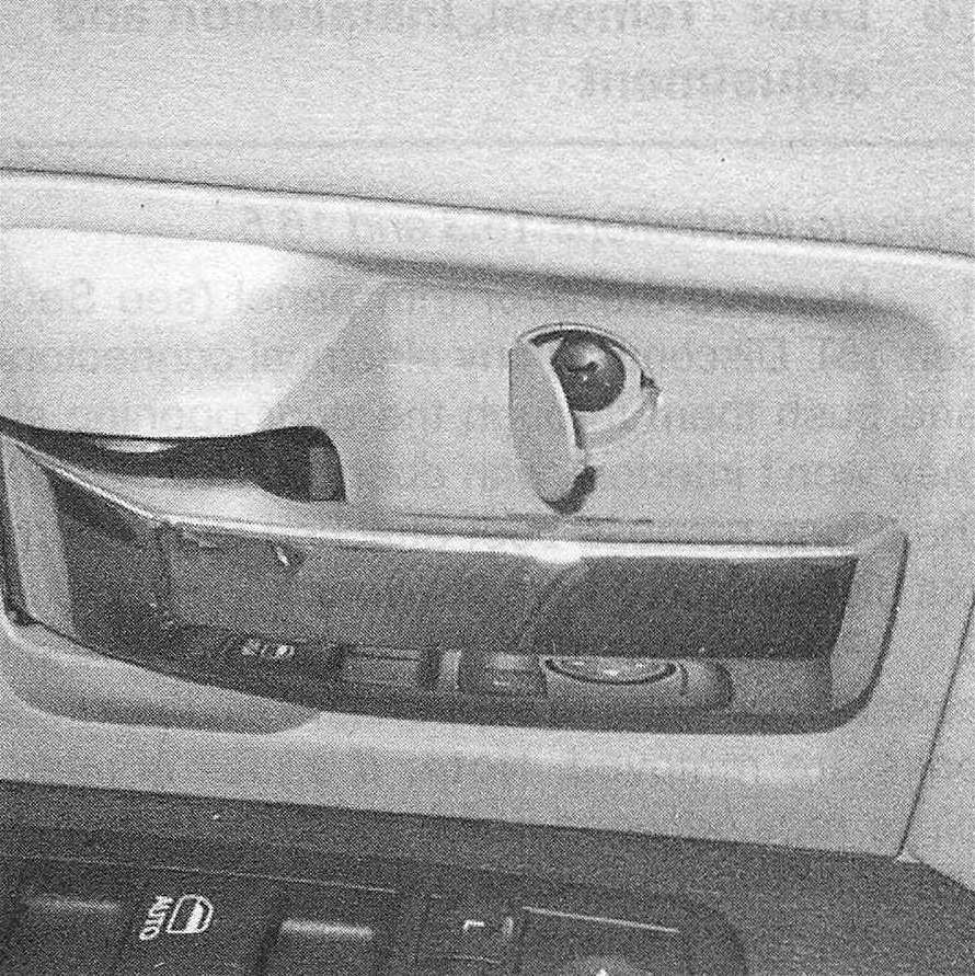 Ram Trucks Door trim panels - There is a concealed screw under the inside door handle