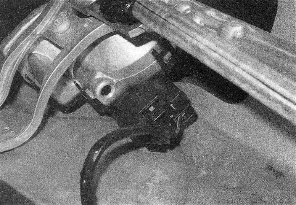 Ram Trucks Windshield wiper motor - Disconnect the wiring from the wiper motor