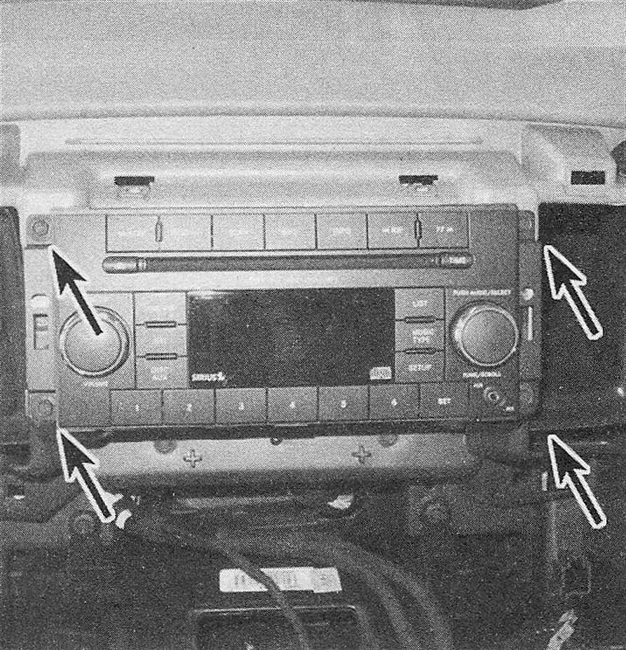 Ram Trucks Radio and speakers - Remove the four radio