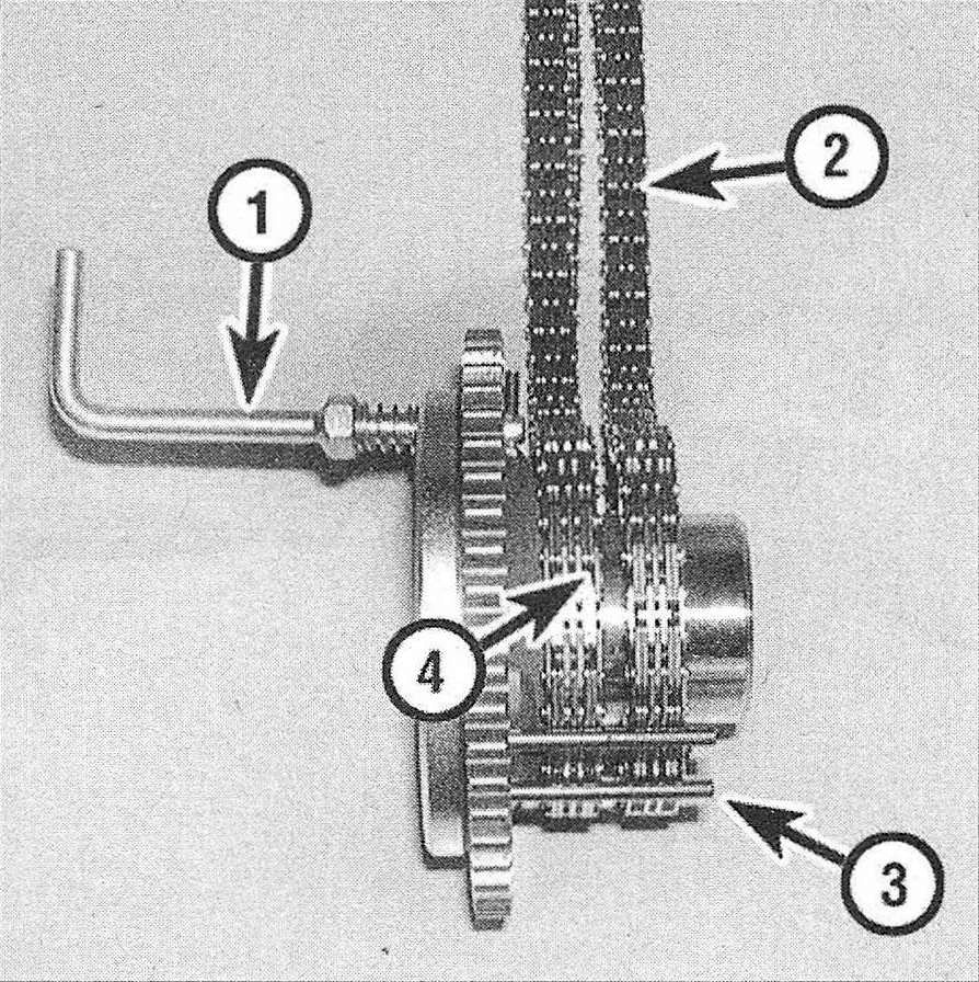 RAM Trucks 3.7L V6 and 4.7L V8 engines Install the secondary chain holding tool onto the idler sprocket with the plated links on the right camshaft chain in the 4 o'clock position and the left camshaft chain in the 8 o'clock position (typical)