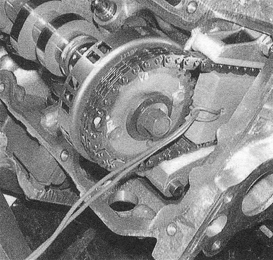 RAM Trucks 3.7L V6 and 4.7L V8 engines The timing chain tensioner wedge is pushed down between the chain strands to secure the secondary chain and the tensioner in place while the camshaft is removed - this wedge is fabricated from a block of wood and a piece of wire