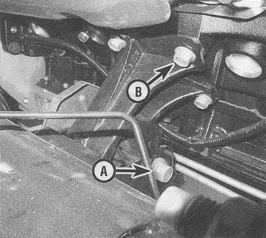 RAM Trucks 3.7L V6 and 4.7L V8 engines Each engine mount is secured by the through-bolt (A) and the mount-to-engine block bolts (B)