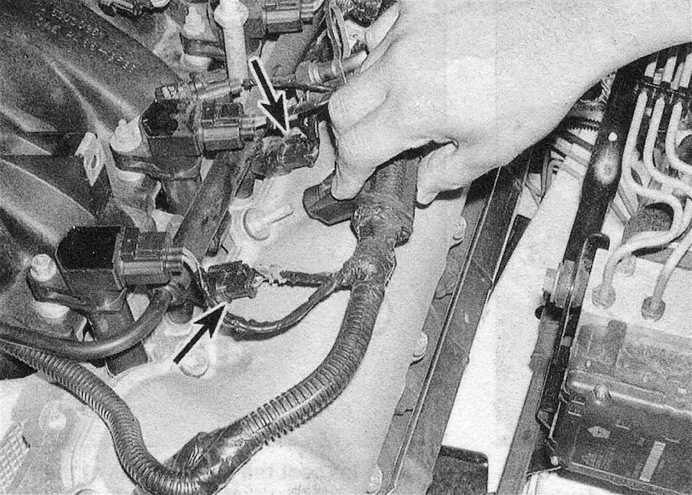 RAM Trucks 3.7L V6 and 4.7L V8 engines Detach the wiring harness from the valve cover studs, then disconnect the fuel injector electrical connectors and position the harness aside