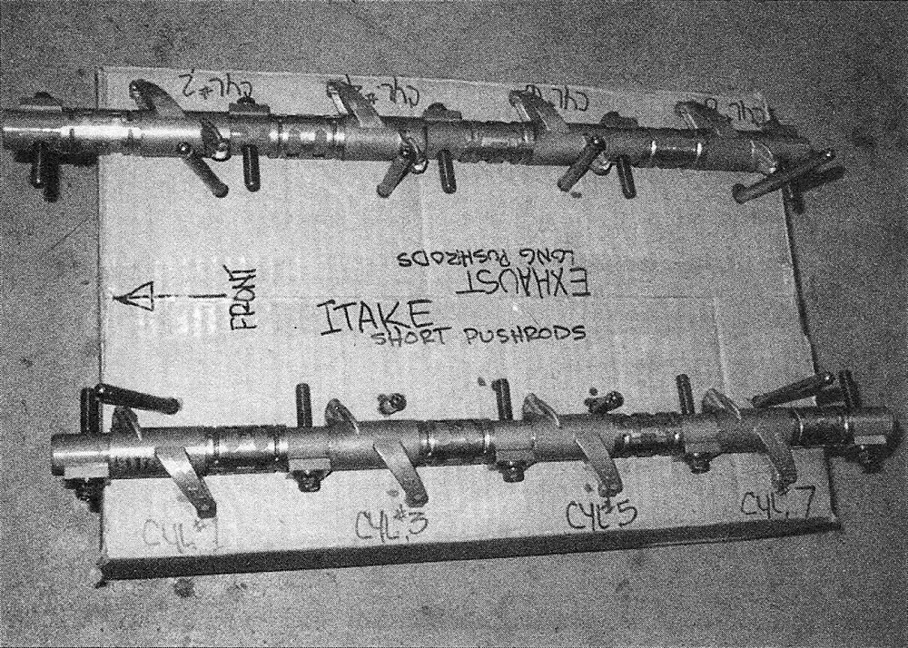 RAM Trucks Hemi engine A perforated sheet of cardboard can be used to store the rocker arms and pushrods to ensure that they're reinstalled in their original locations - note the arrow indicating the front of the engine