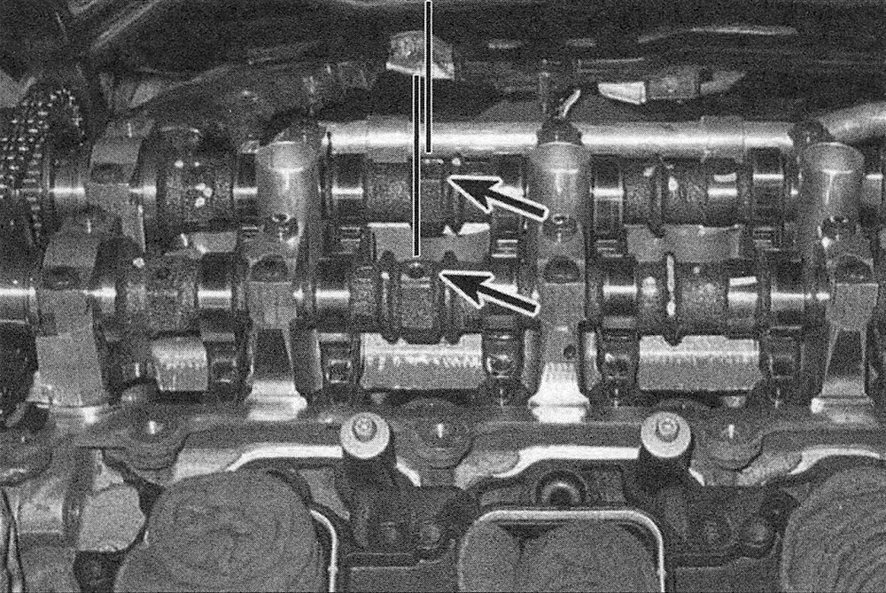 RAM Trucks 3.6L V6 engine Locate the alignment holes on the camshafts and make sure they are in the neutral position (pointing straight up) — right side shown, left side is identical