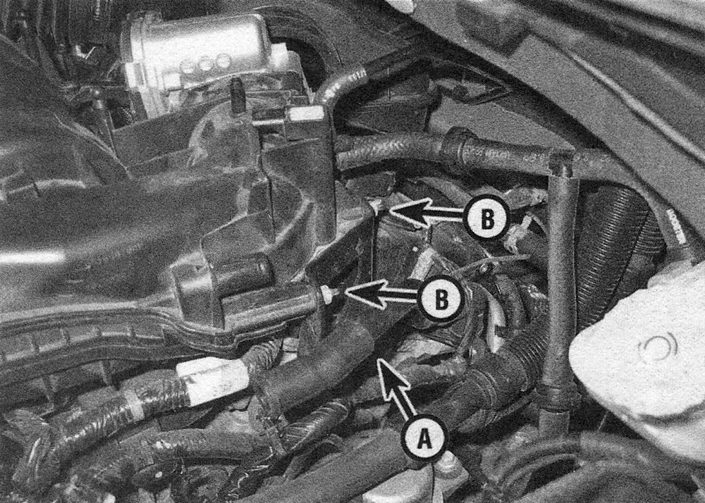 RAM Trucks 3.6L V6 engine Remove the stud bolt (A) and bracket nuts (B), and remove the bracket