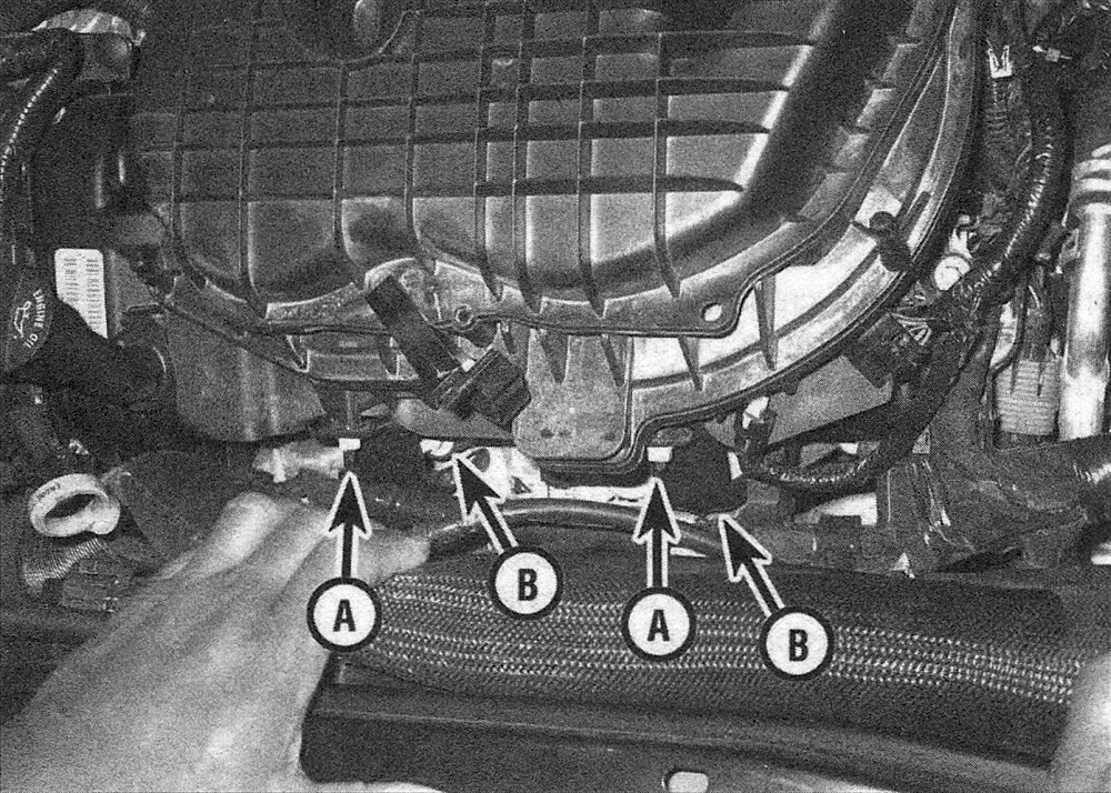 RAM Trucks 3.6L V6 engine Remove the support bracket upper nuts (A), loosen the lower