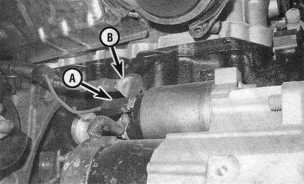 RAM Trucks Engine electrical systems Disconnect the electrical connector (A) from the spade terminal on the solenoid, then remove the nut and disconnect the battery cable (B) from the terminal stud on the solenoid (starter motor on 3.7L V6 shown, starters on 4.7L V8 similar)