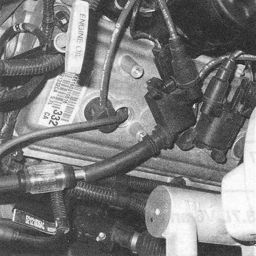 RAM Trucks Engine electrical systems remove the ignition coil (Ignition coil - check and replacement), connect the tester to the spark plug boot, connect the other end of the tester to the spark plug and crank over the engine again