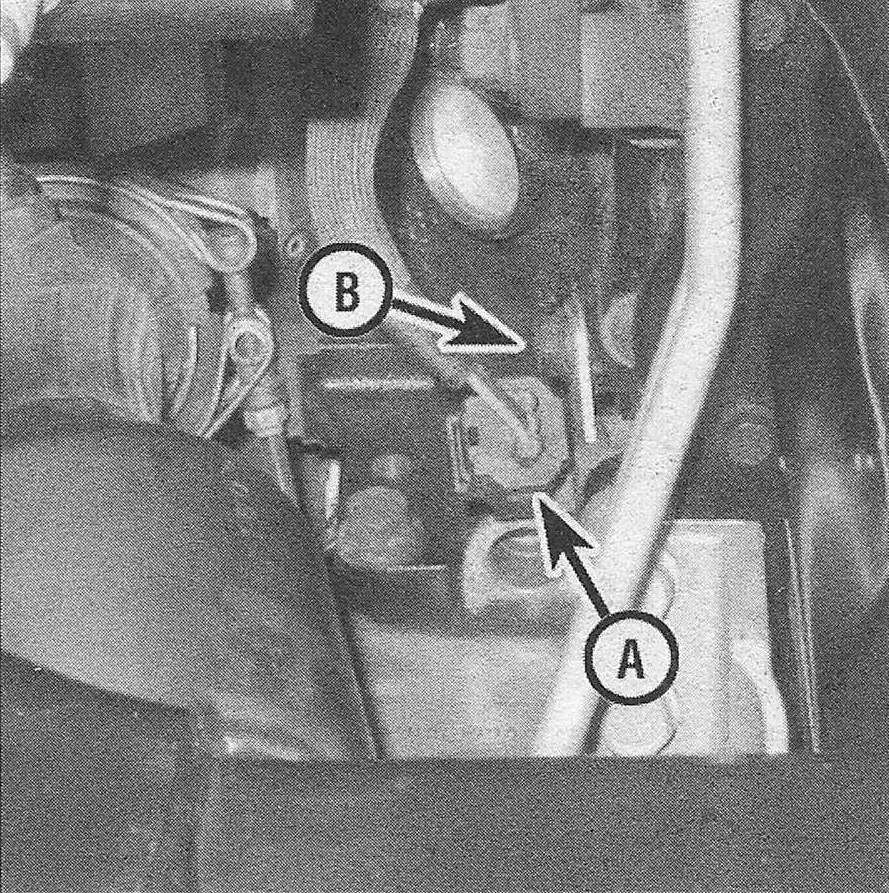 RAM Trucks Disconnect the CKP sensor electrical connector (A) and remove the sensor mounting bolt (B) (3.7L V6 engine)