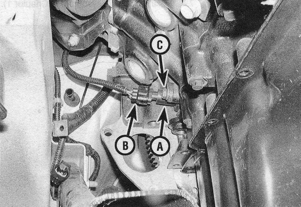 RAM Trucks Disconnect the CKP sensor (A) electrical connector (B) and remove the sensor mounting bolt (C) (4.7L V8 engine)