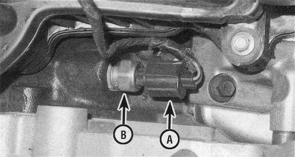 RAM Trucks Disconnect the ECT sensor electrical connector (A) and unscrew the sensor (B) from the manifold (Hemi engine)