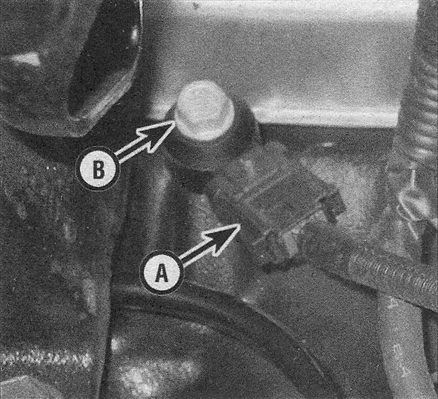 RAM Trucks Disconnect the knock sensor electrical connector (A) and remove the knock sensor mounting bolt (B) (Hemi engine)