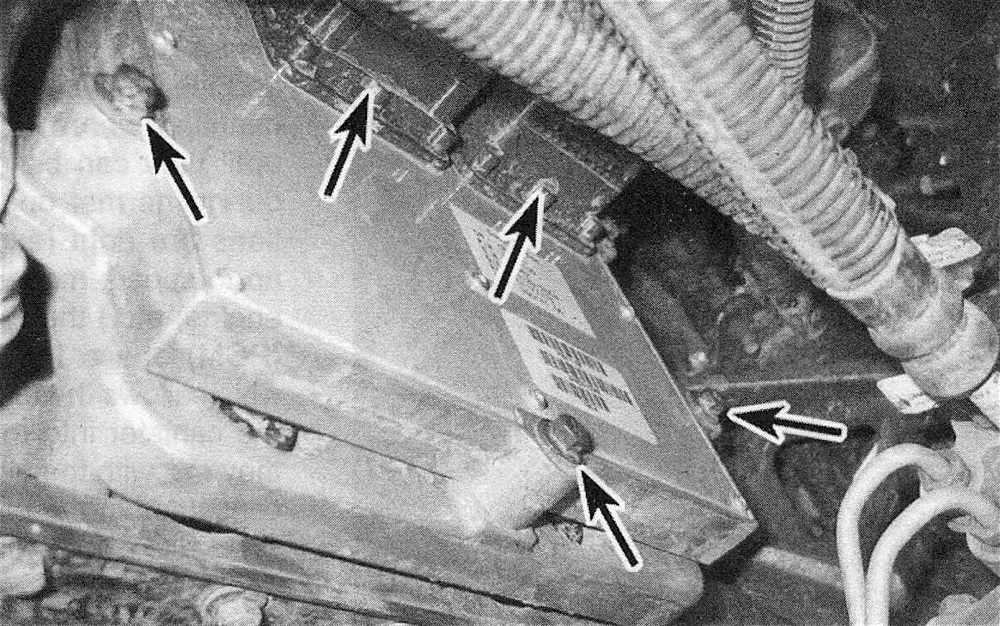 RAM Trucks Disconnect the PCM electrical connectors and remove the mounting bolts (some models use three mounting bolts, while others use five) (diesel engine)