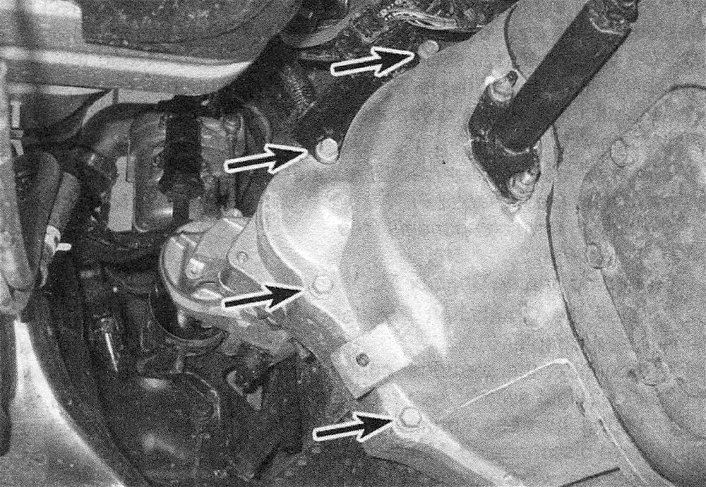 RAM Trucks Left-side transmission mounting bolts (not all bolts are visible in this photo; the two center bolts are the starter mounting bolts, which will already have been removed)