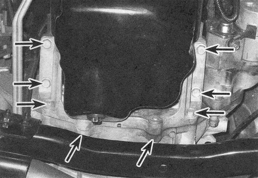 RAM Trucks To remove the transmission brace on a vehicle with 45RFE or 545RFE transmission, remove these bolts (Hemi engine shown, others similar)