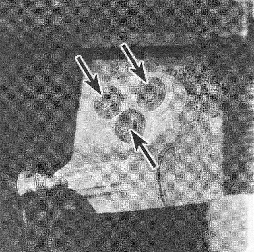 RAM Trucks Front axle assembly (4WD models) – Remove the axle housing pinion mounting bolts (shown), then the axle tube mounting bolts and the differential housing-to-engine bolts