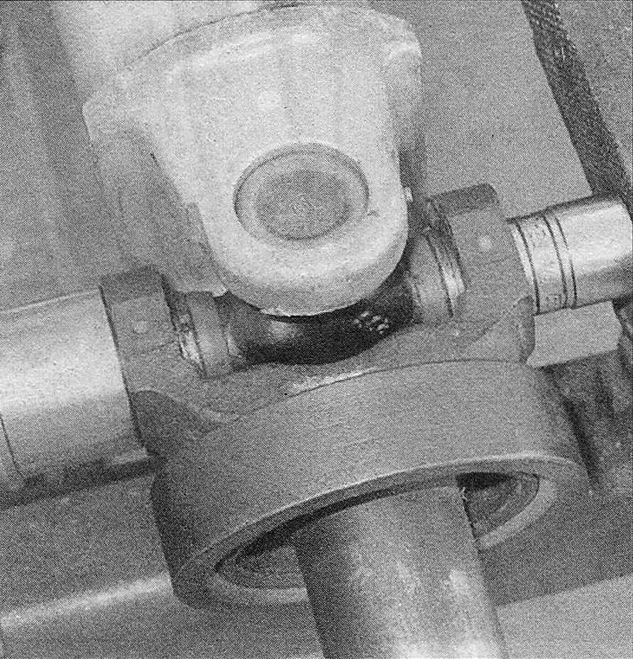 RAM Trucks To press the universal joint out of the driveshaft yoke, set it up in a vise with the small socket pushing the joint and bearing cap into the large socket