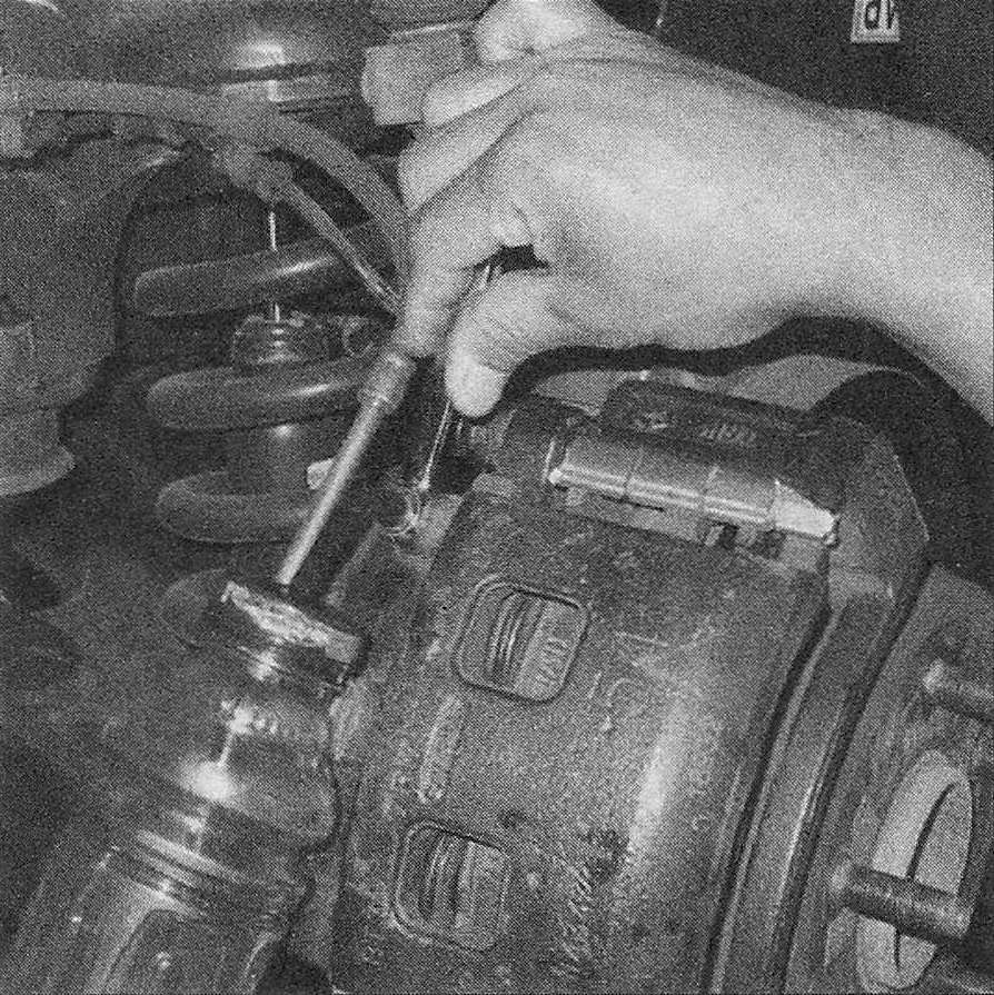 RAM Trucks Brakes When bleeding the brakes, a hose is connected to the bleed screw at the caliper and submerged in brake fluid - air will be seen as bubbles in the tube and container (all air must be expelled before moving to the next wheel)